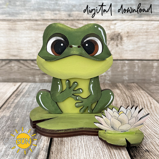Layered frog shelf sitter SVG featuring a cute frog on a lily pad with a water lily, laser cut file for interchangeable farmhouse shelf decor.