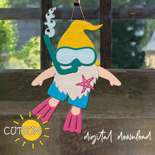 Layered wooden door hanger of a gnome in scuba gear with goggles, snorkel, starfish, and pink flippers, ready for summer fun.