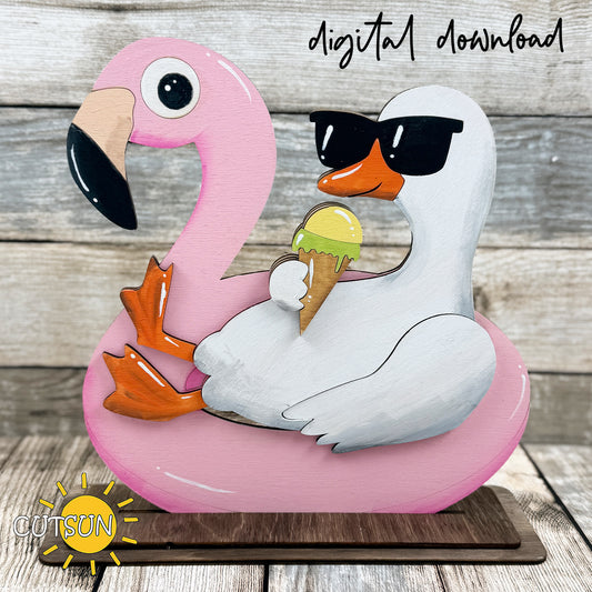 Layered wooden shelf sitter of a goose wearing sunglasses on a flamingo float holding an ice cream