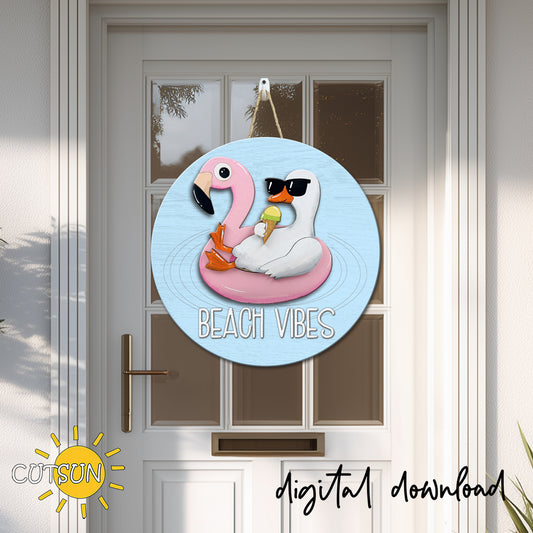 Round summer door sign with goose in sunglasses on a pink flamingo float and Beach Vibes text