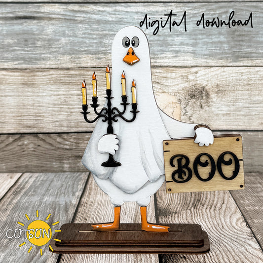 Layered ghost goose Halloween shelf sitter holding a candelabra and BOO sign, freestanding laser cut farmhouse Halloween decor SVG file.