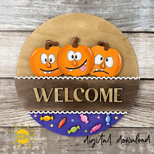 Layered funny pumpkin SVG insert with silly pumpkin faces and candy accents for interchangeable round Halloween door hanger decor.