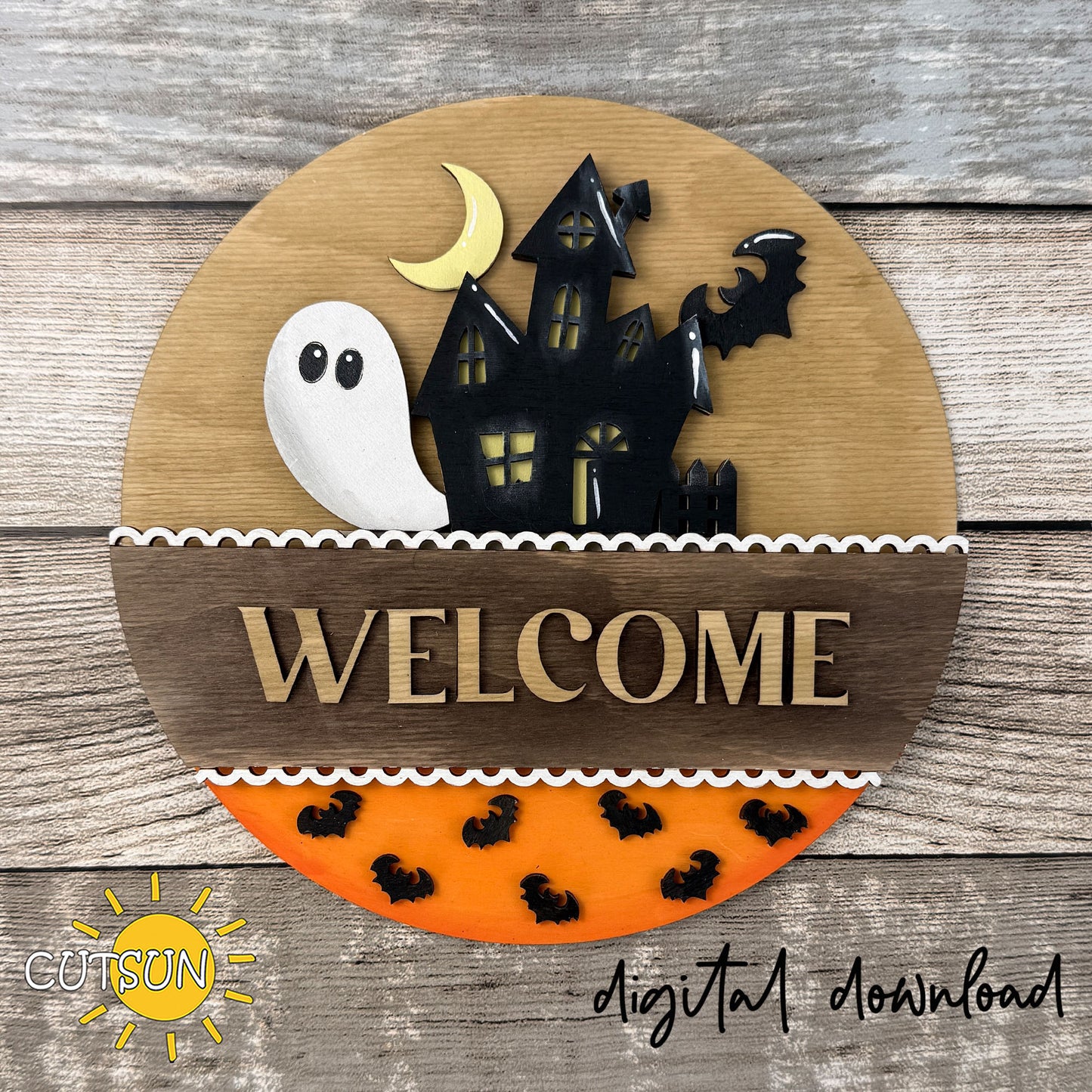 Layered haunted house Halloween SVG insert with ghost, crescent moon, and bat accents for interchangeable round door hanger decor.