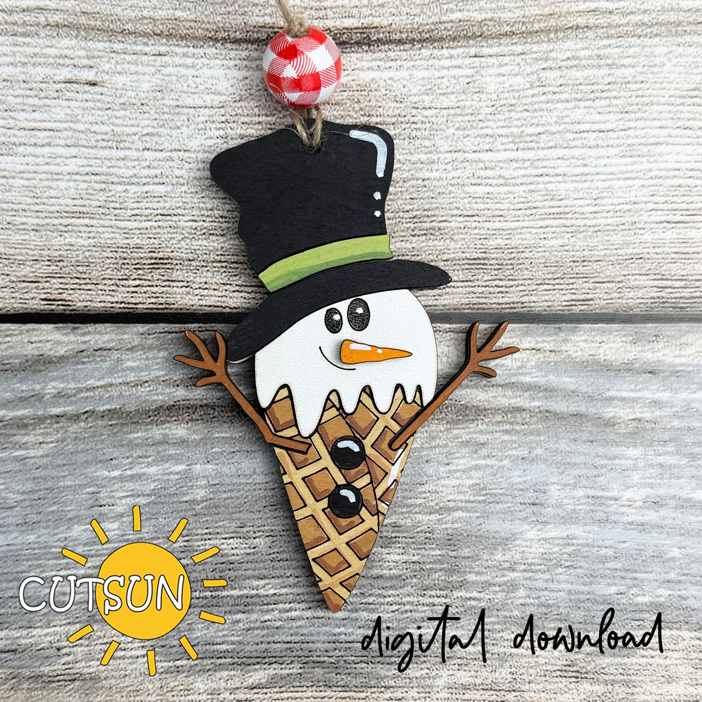Melting snowman ice cream ornament SVG cut file with top hat, carrot nose, and waffle cone design for Christmas crafts.
