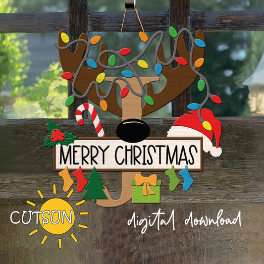 Laser cut Christmas door sign - monogram letter J with antlers, Christmas lights, candy cane, holly berry, a Christmas tree, a present, Santa hat and four stockings.