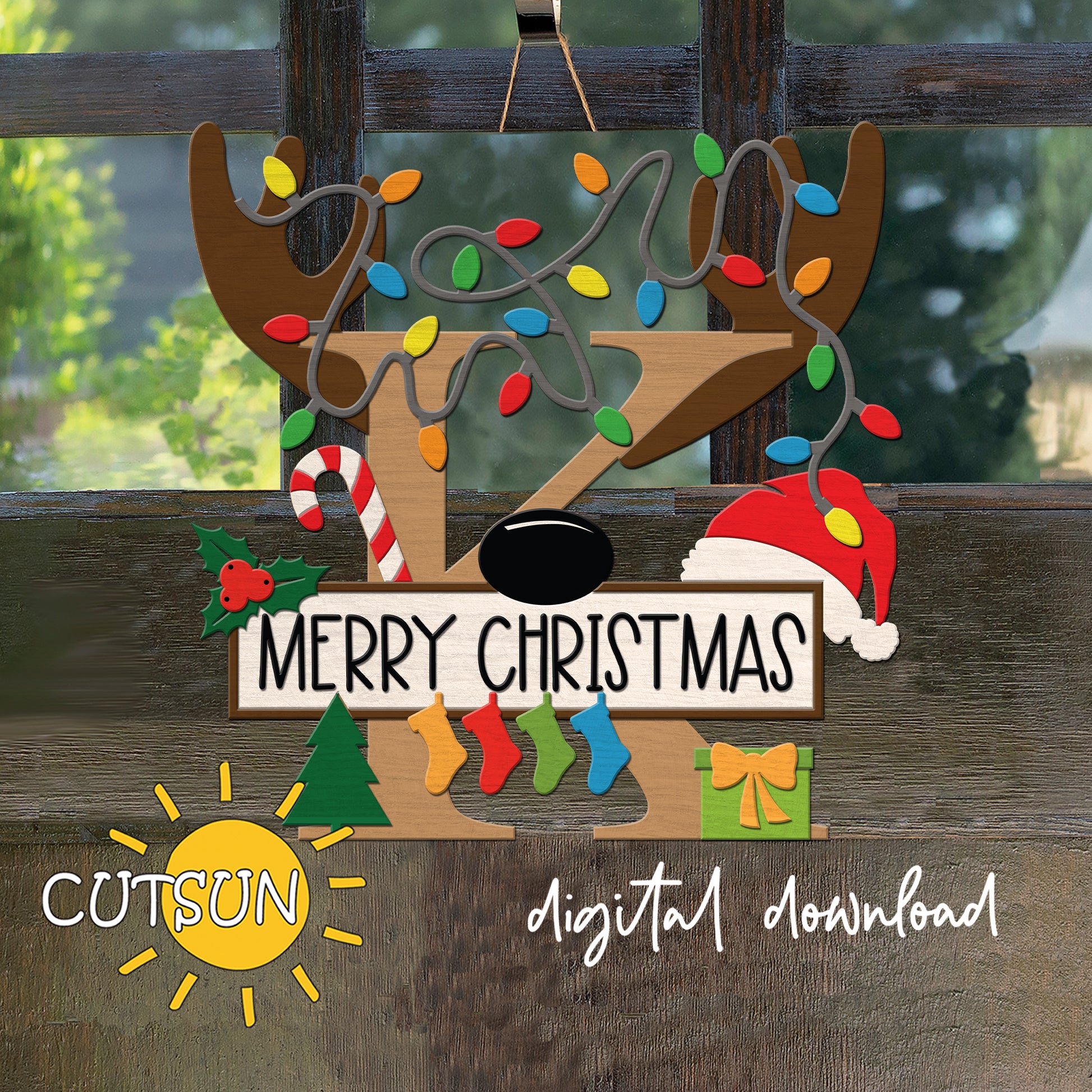 Laser cut Christmas door sign - monogram letter K with antlers, Christmas lights, candy cane, holly berry, a Christmas tree, a present, Santa hat and four stockings.