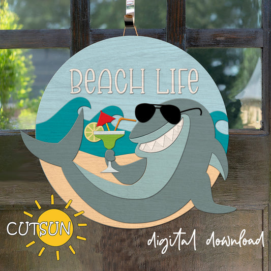 Layered SVG door sign with shark wearing sunglasses holding a margarita, “Beach Life” quote – beach-themed laser cut file