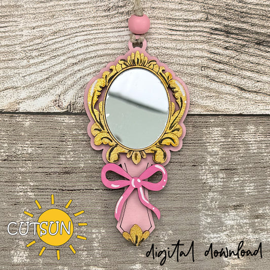 Pink and gold rococo mirror ornament with ribbon bow, designed for laser cutting.