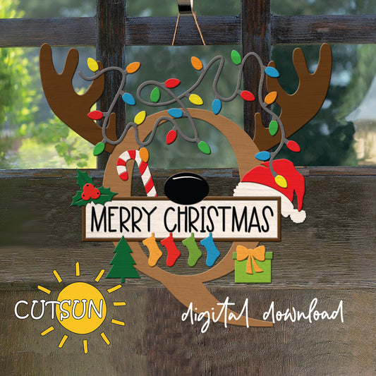 Laser cut Christmas door sign - monogram letter Q with antlers, Christmas lights, candy cane, holly berry, a Christmas tree, a present, Santa hat and four stockings.