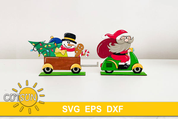 Standing Christmas decoration with Santa on a motorcycle and a wagon full with Christmas items