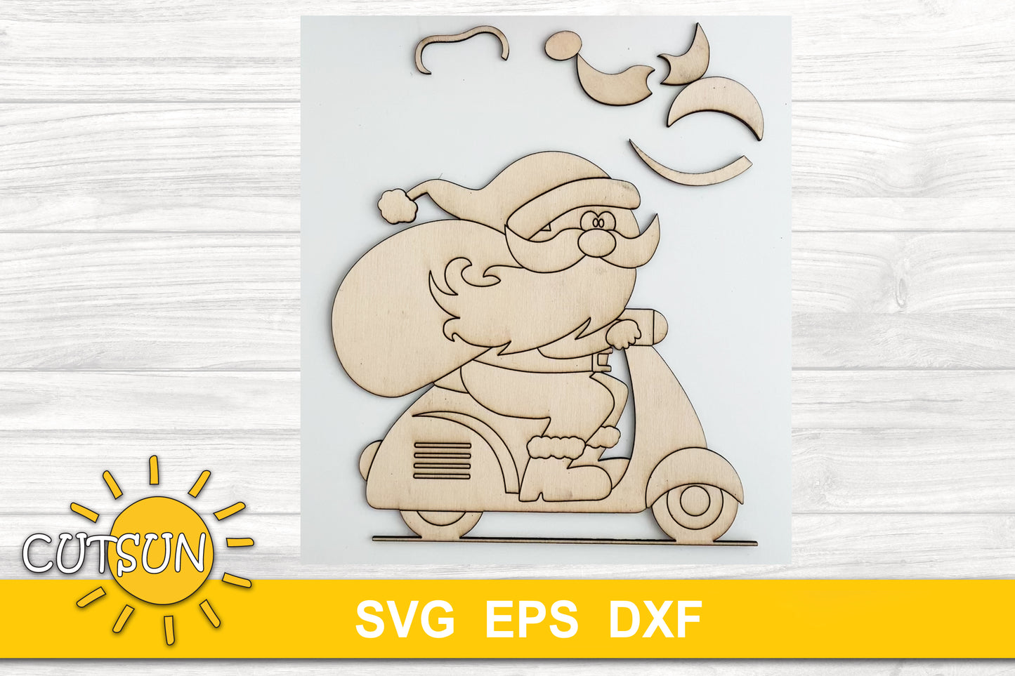 Standing Christmas decoration with Santa on a motorcycle and a wagon full with Christmas items