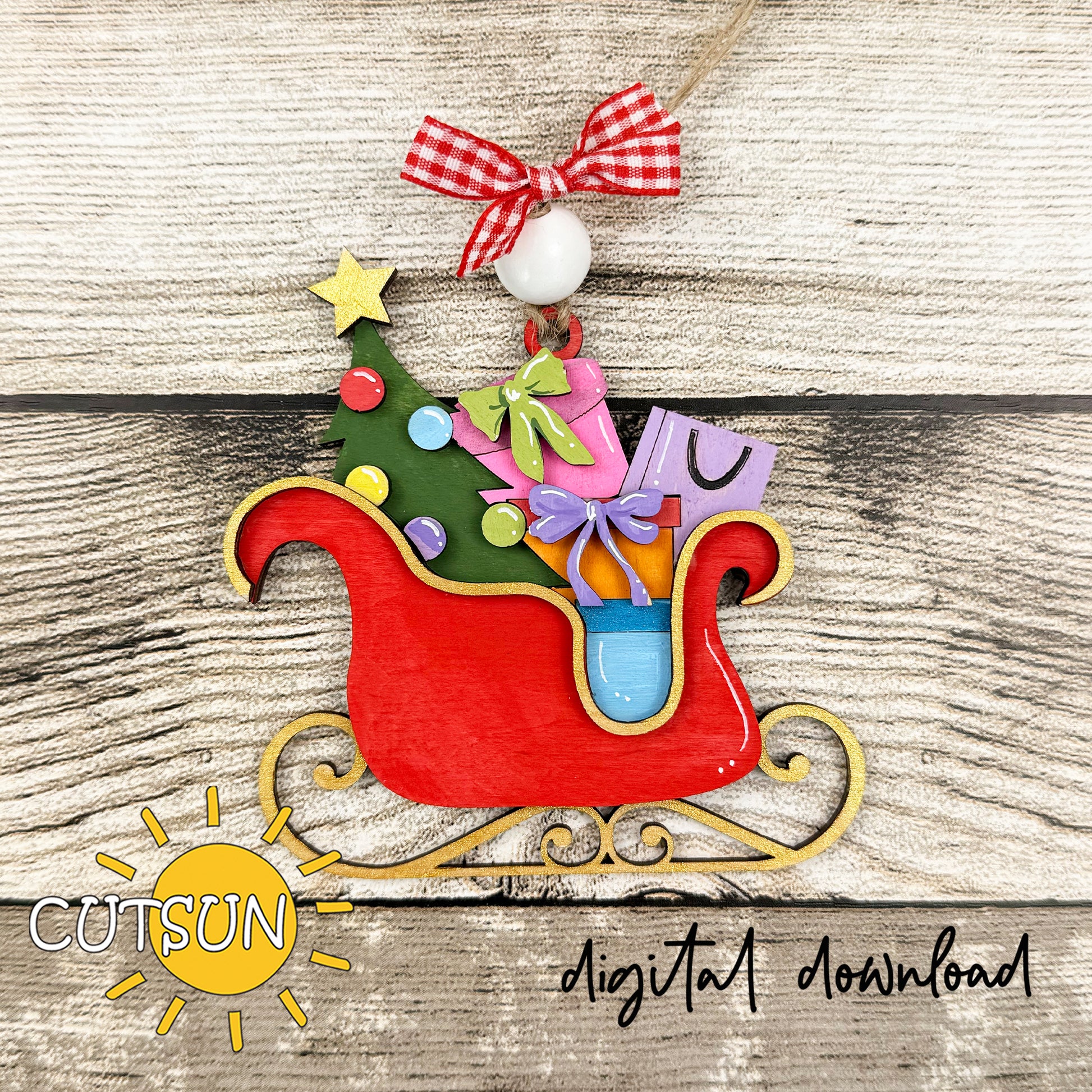 Laser cut Christmas sleigh ornament SVG with gifts and Christmas tree – festive digital design for holiday crafts.