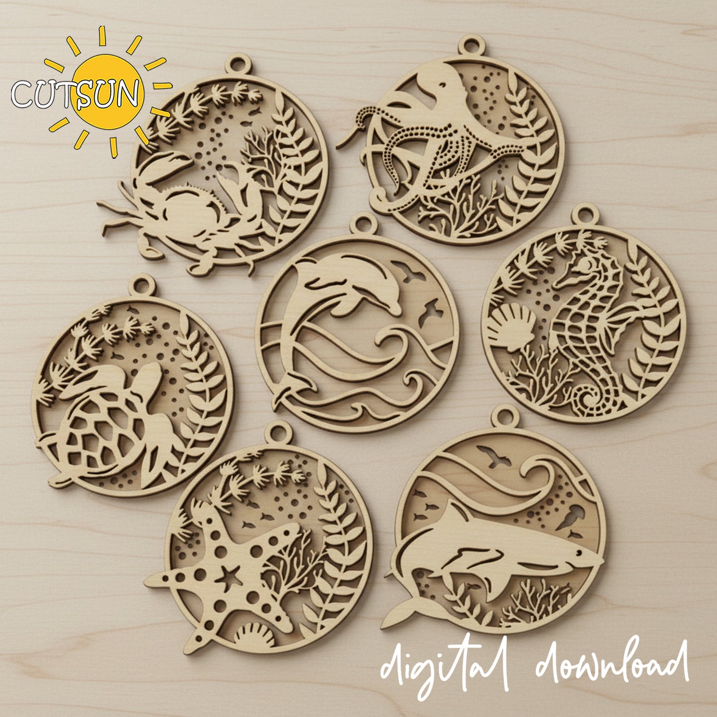 Set of wooden laser cut designs with sea animal cutouts on a wooden surface, featuring the brand 'COTSON'.