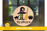 SVG digital download for a round Halloween door hanger with a hissing black cat, a witch's hat and legs, a witch's broom and a cauldron and the saying The witch is in