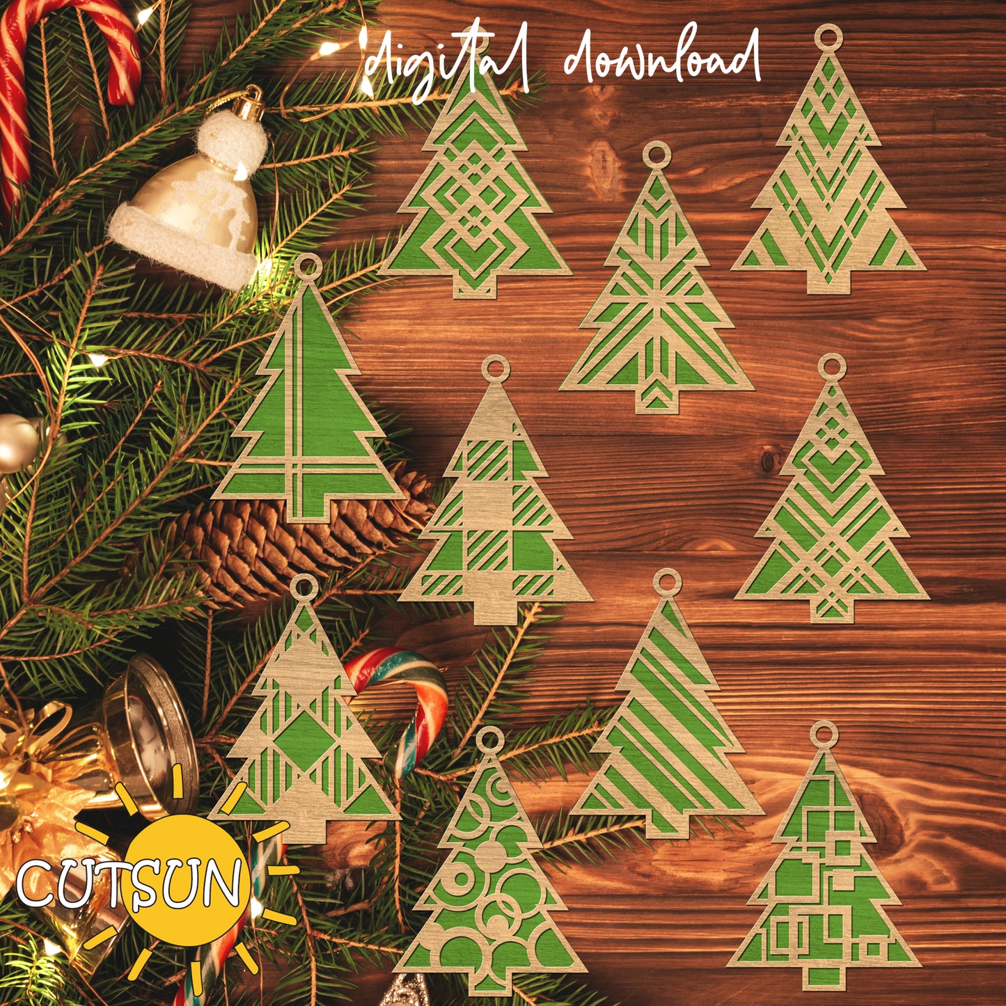 Decorative Christmas tree cutouts on a wooden surface with holiday decorations.