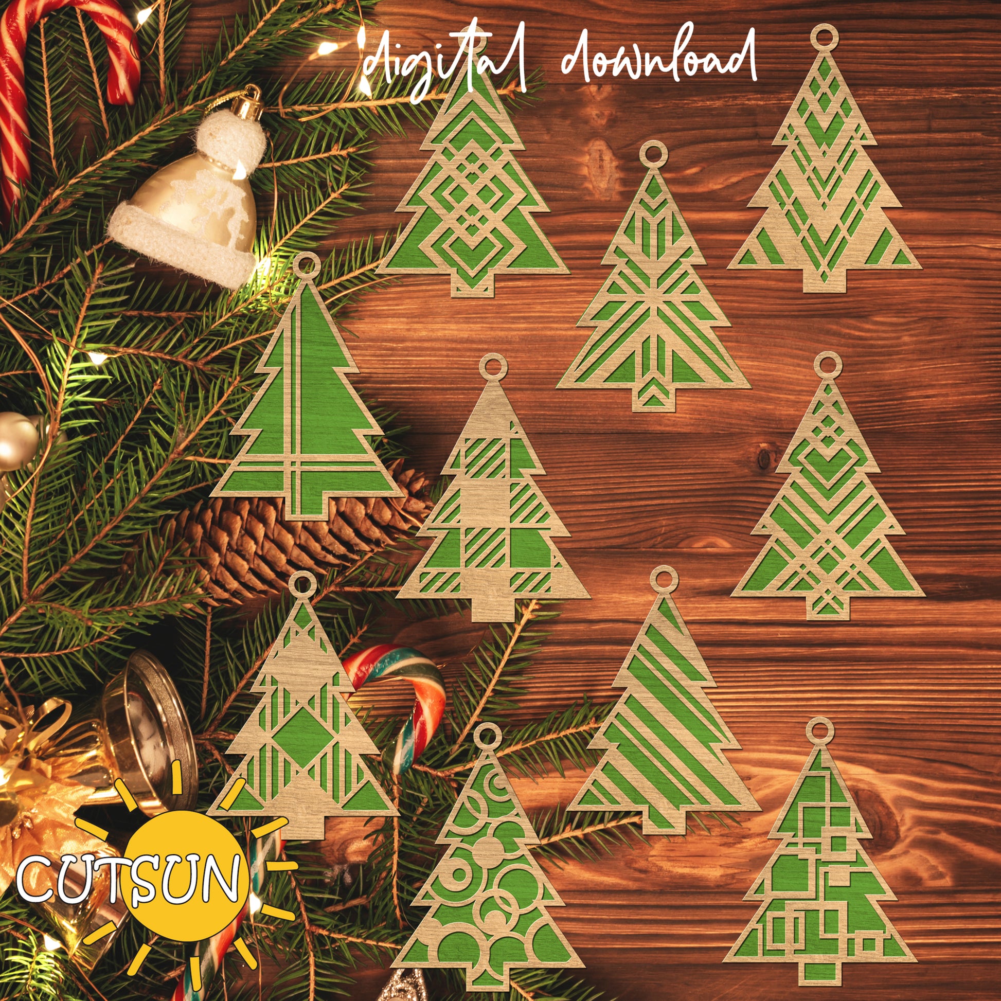 Decorative Christmas tree cutouts on a wooden surface with holiday decorations.