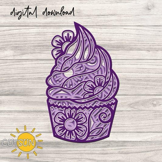 Digital download of a layered cupcake design with purple icing and floral patterns, displayed on a wooden background.