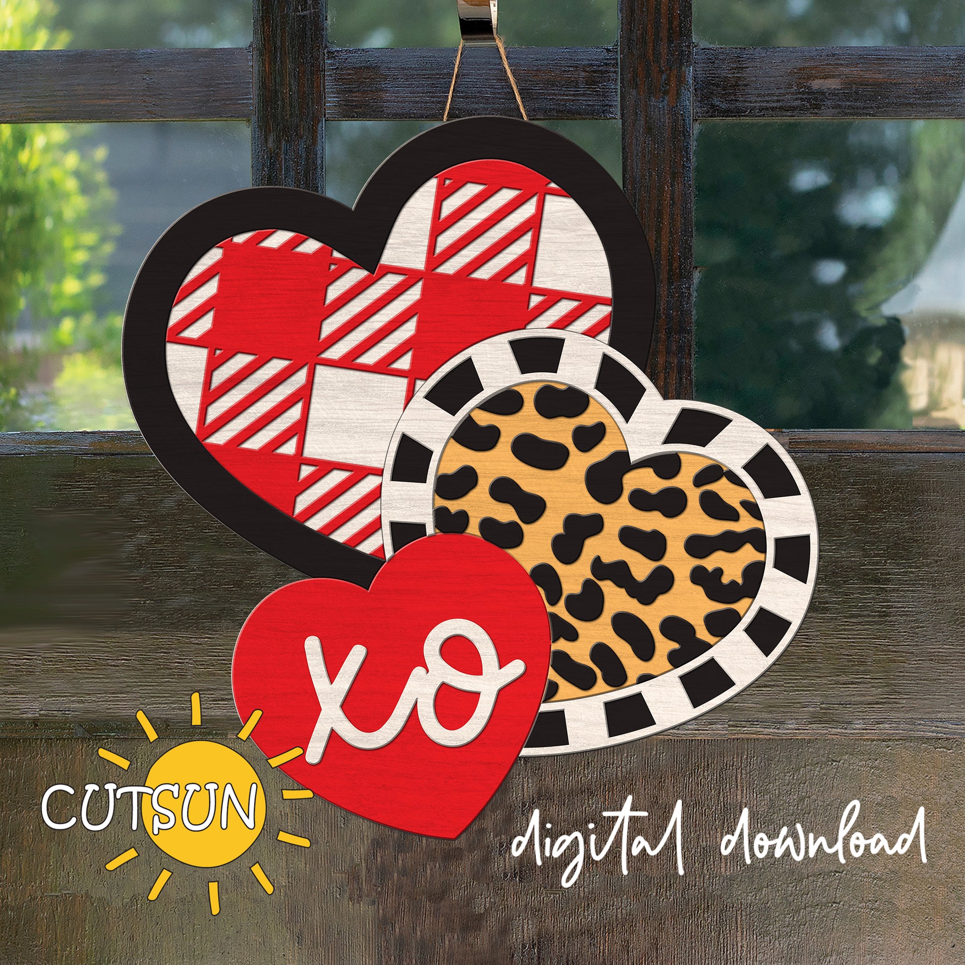 Heart-shaped decorations with different patterns on a wooden surface, featuring the brand 'CUTSUN'.