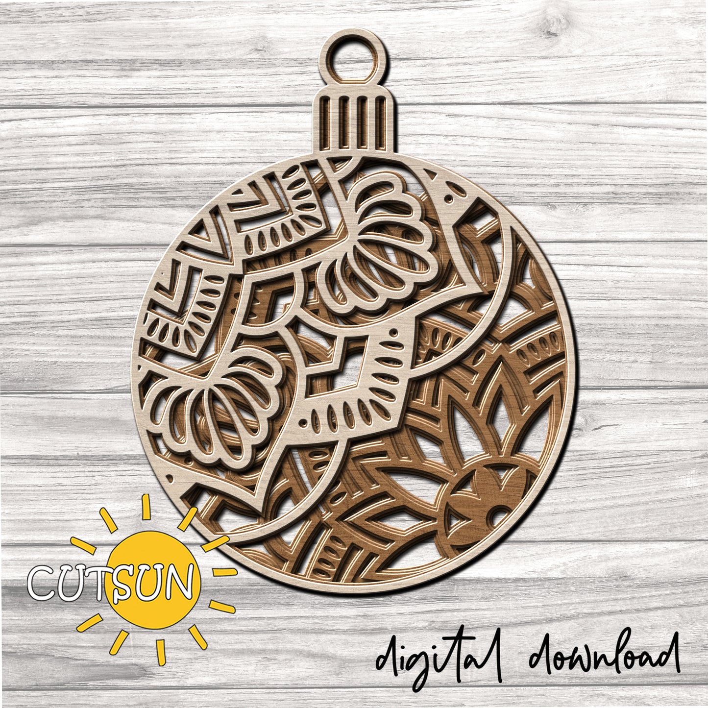 layered decorative Christmas ornament with mandala elements