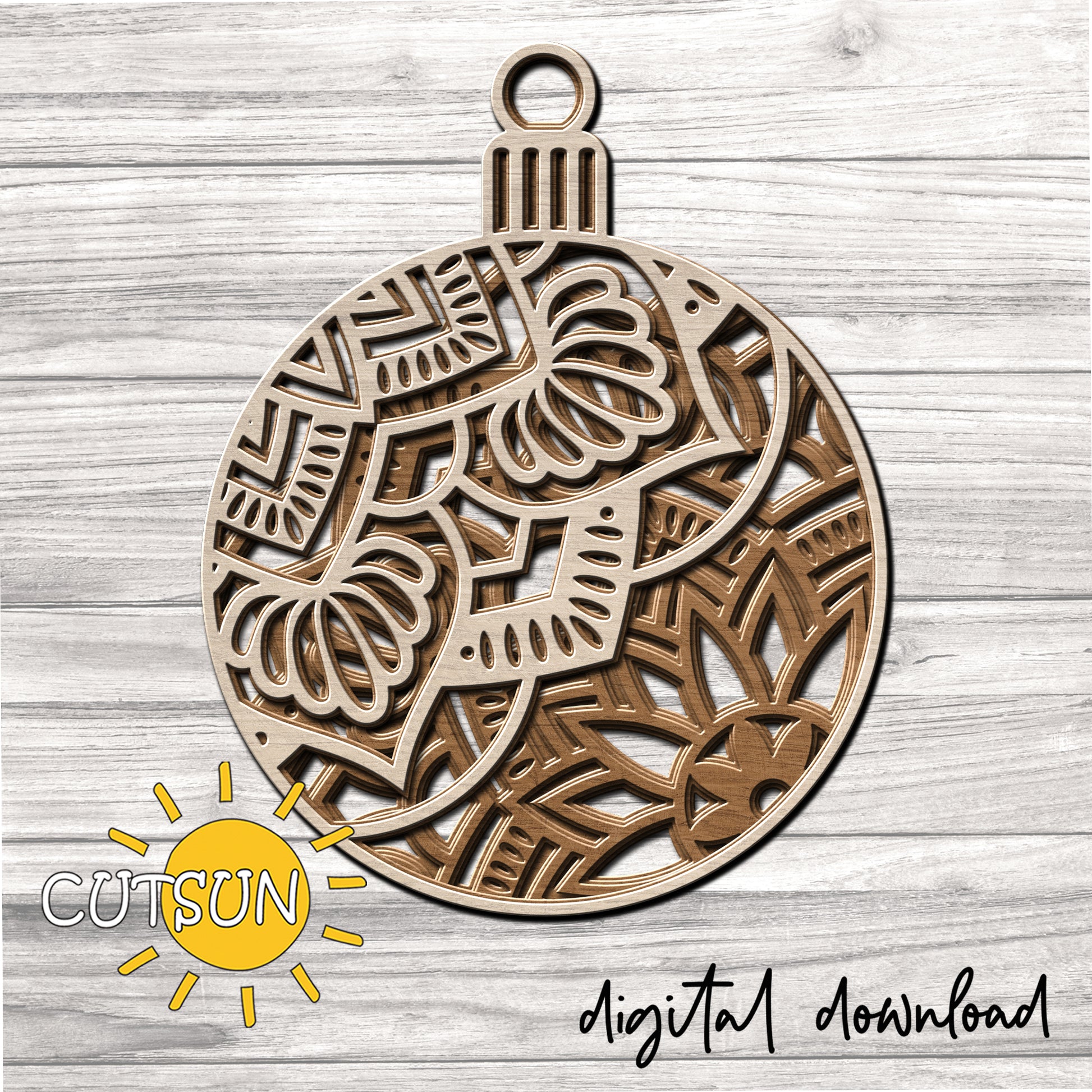 layered decorative Christmas ornament with mandala elements