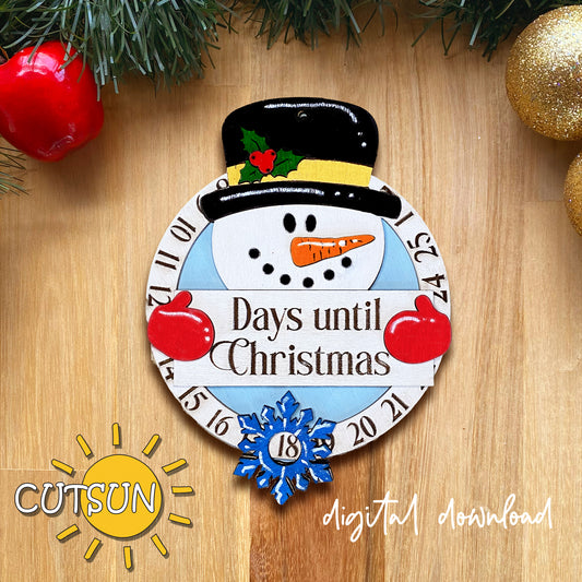 Christmas countdown timer with snowman design on a wooden surface, featuring the brand 'CUTSUN'.